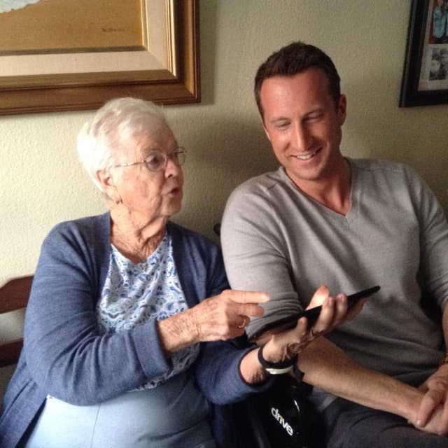 The founder of NeuroMotive with his great-aunt during a reminiscence session