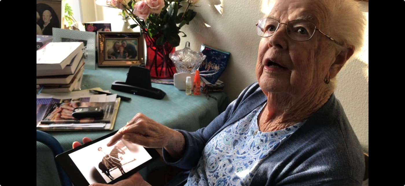 The founder's great-aunt, animated and engaged during a reminiscence session